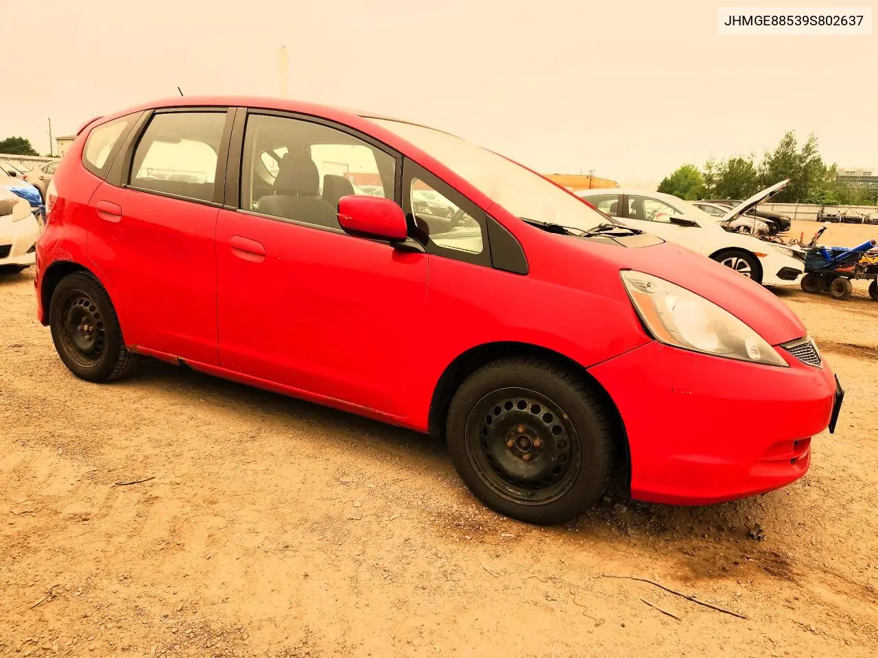 2009 Honda Fit Lx VIN: JHMGE88539S802637 Lot: 61036306