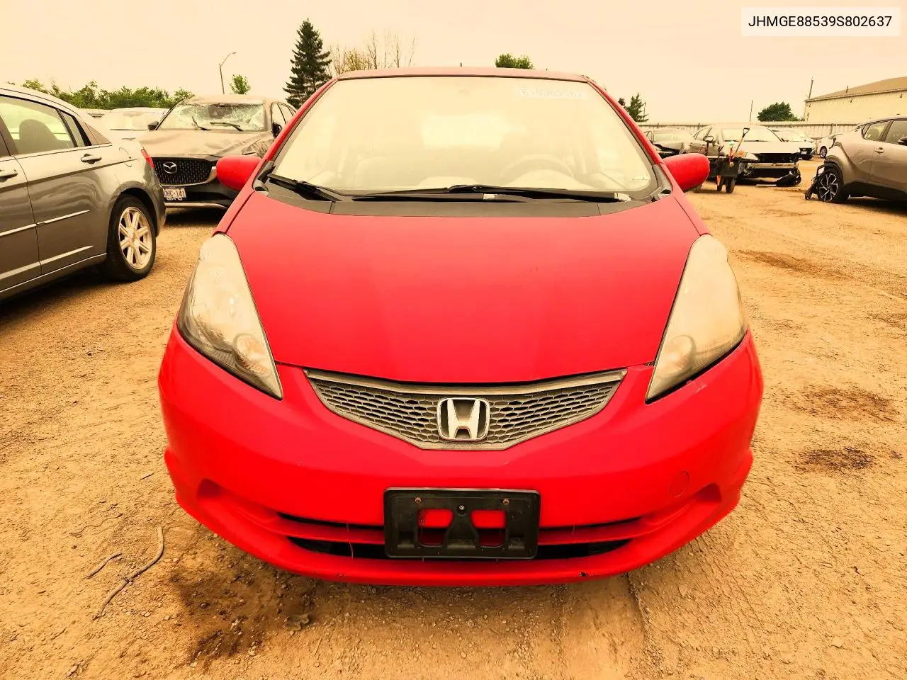 2009 Honda Fit Lx VIN: JHMGE88539S802637 Lot: 61036306