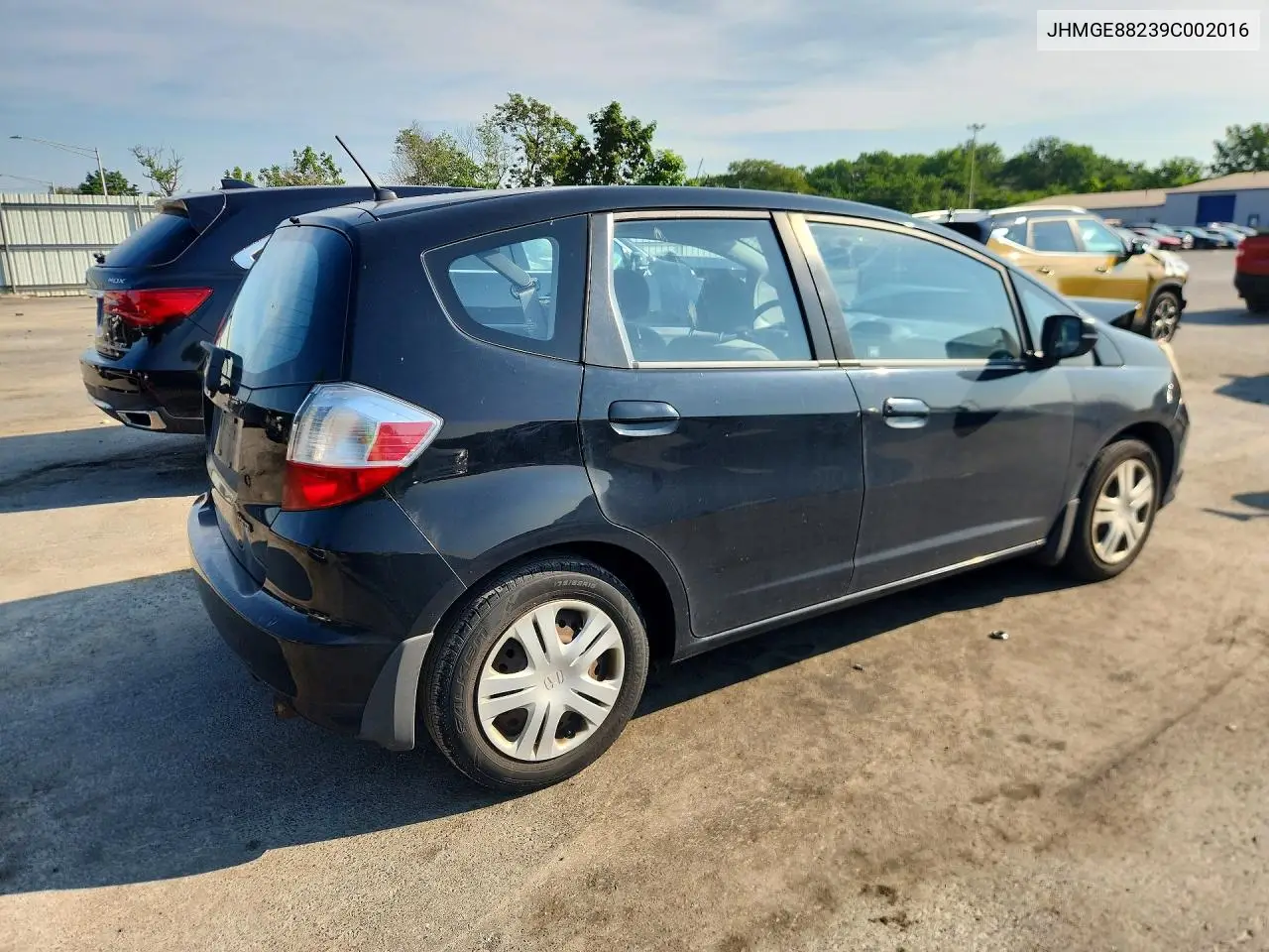 2009 Honda Fit VIN: JHMGE88239C002016 Lot: 61058856