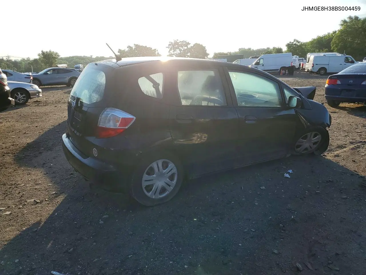 2011 Honda Fit VIN: JHMGE8H38BS004459 Lot: 56990286