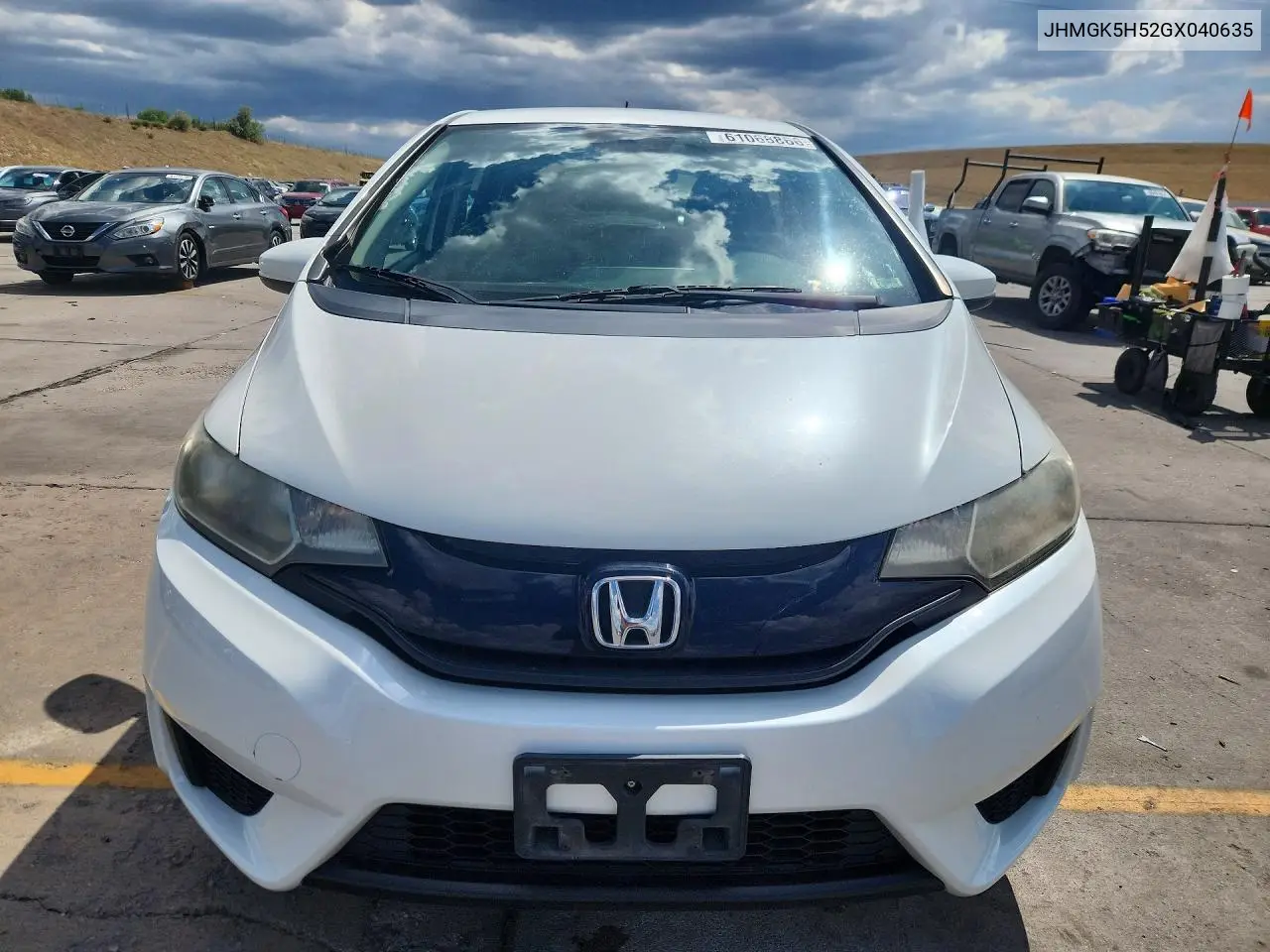 2016 Honda Fit Lx VIN: JHMGK5H52GX040635 Lot: 61068866