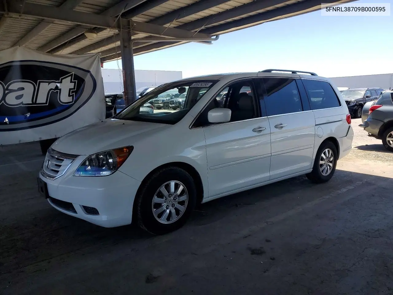 2009 Honda Odyssey Exl VIN: 5FNRL38709B000595 Lot: 58929286