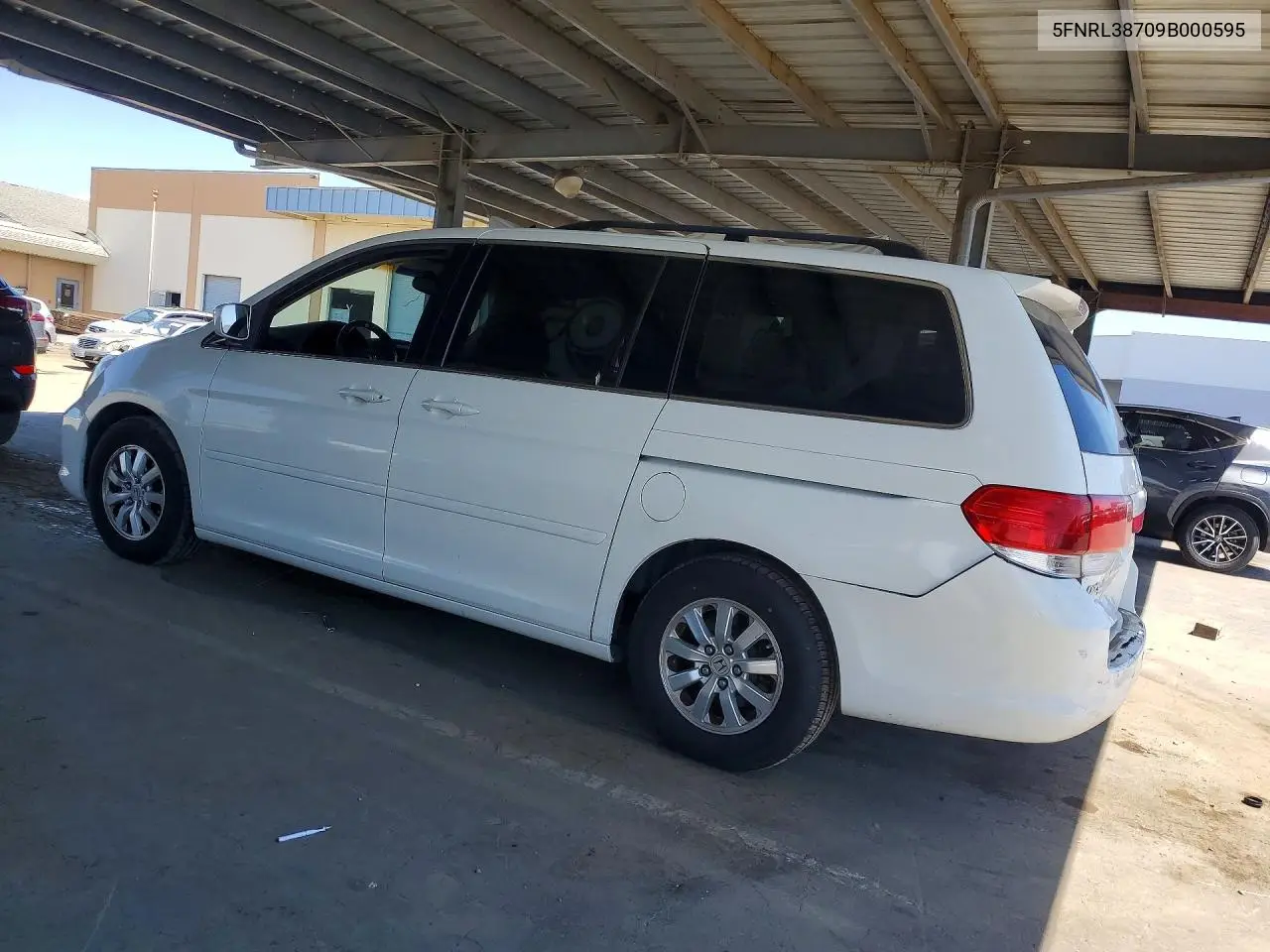 2009 Honda Odyssey Exl VIN: 5FNRL38709B000595 Lot: 58929286