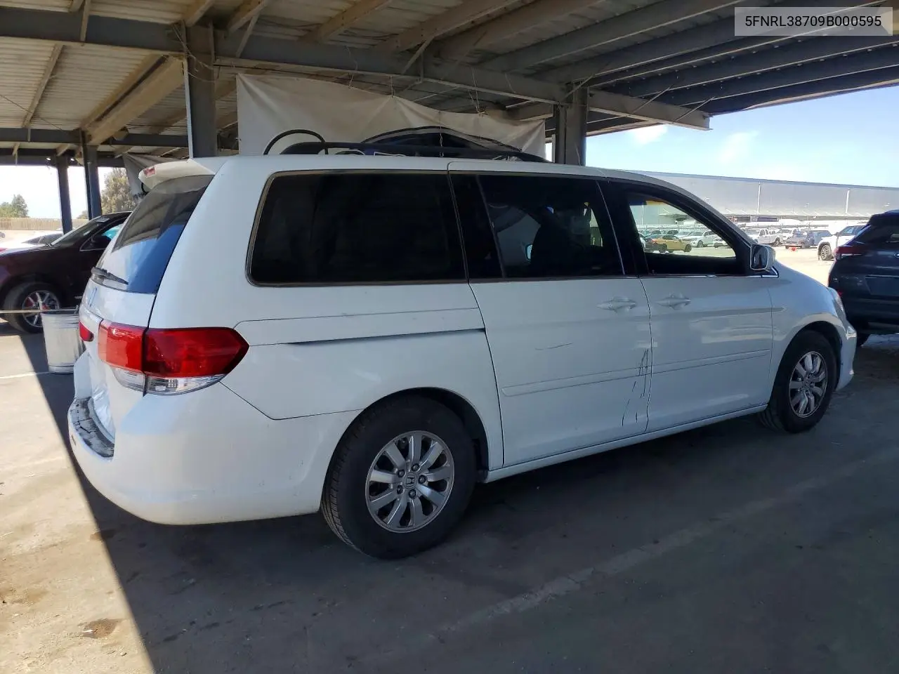 2009 Honda Odyssey Exl VIN: 5FNRL38709B000595 Lot: 58929286