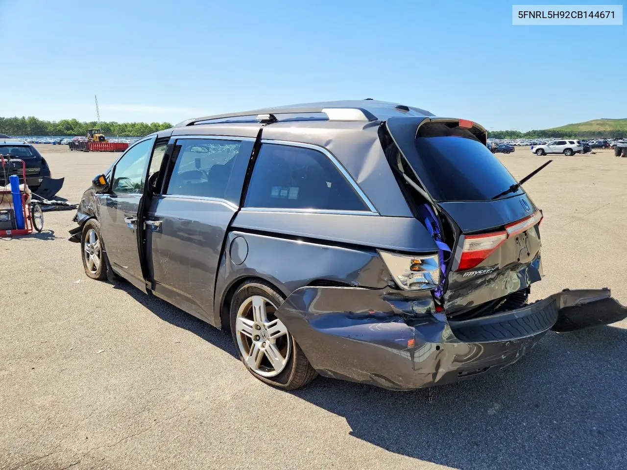 2012 Honda Odyssey Touring VIN: 5FNRL5H92CB144671 Lot: 61485426