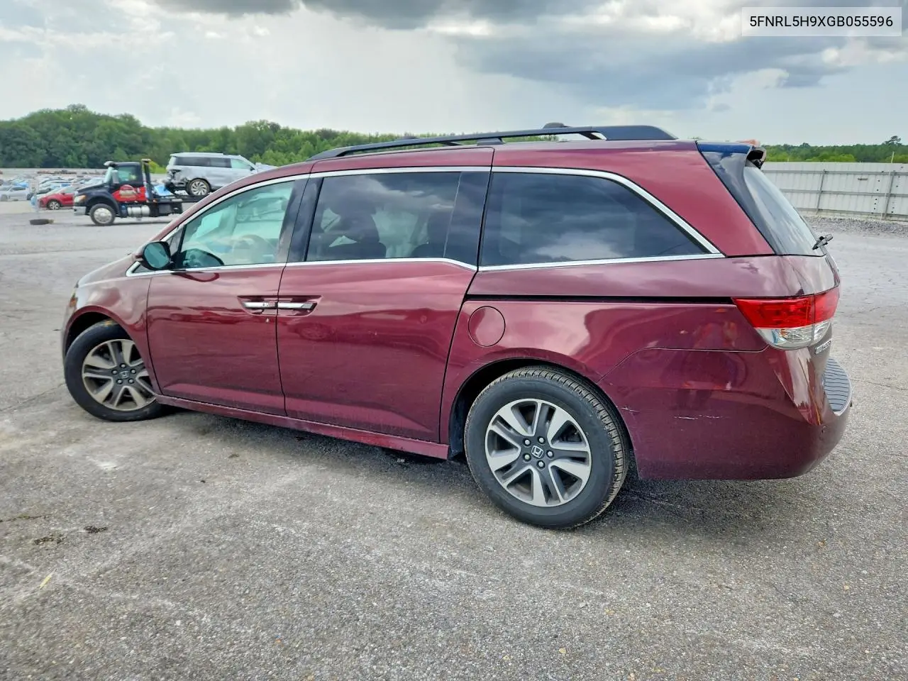 2016 Honda Odyssey Touring VIN: 5FNRL5H9XGB055596 Lot: 61749766