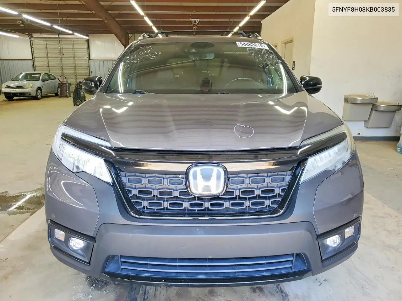 2019 Honda Passport Elite VIN: 5FNYF8H08KB003835 Lot: 58883876