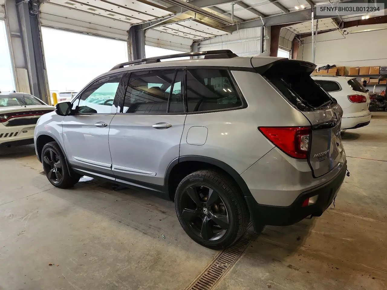 2020 Honda Passport Elite VIN: 5FNYF8H03LB012394 Lot: 54421836