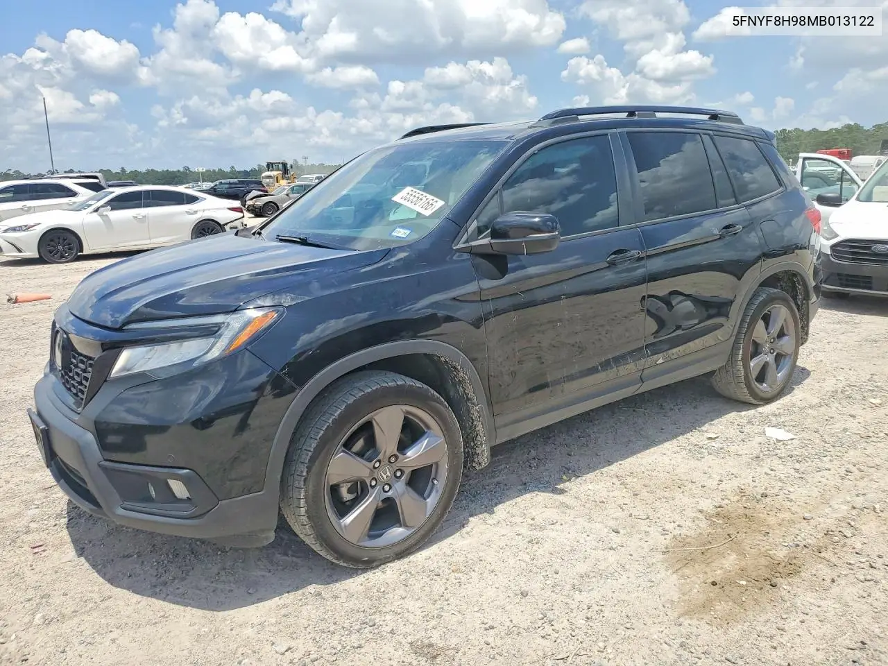 2021 Honda Passport Touring VIN: 5FNYF8H98MB013122 Lot: 55556166