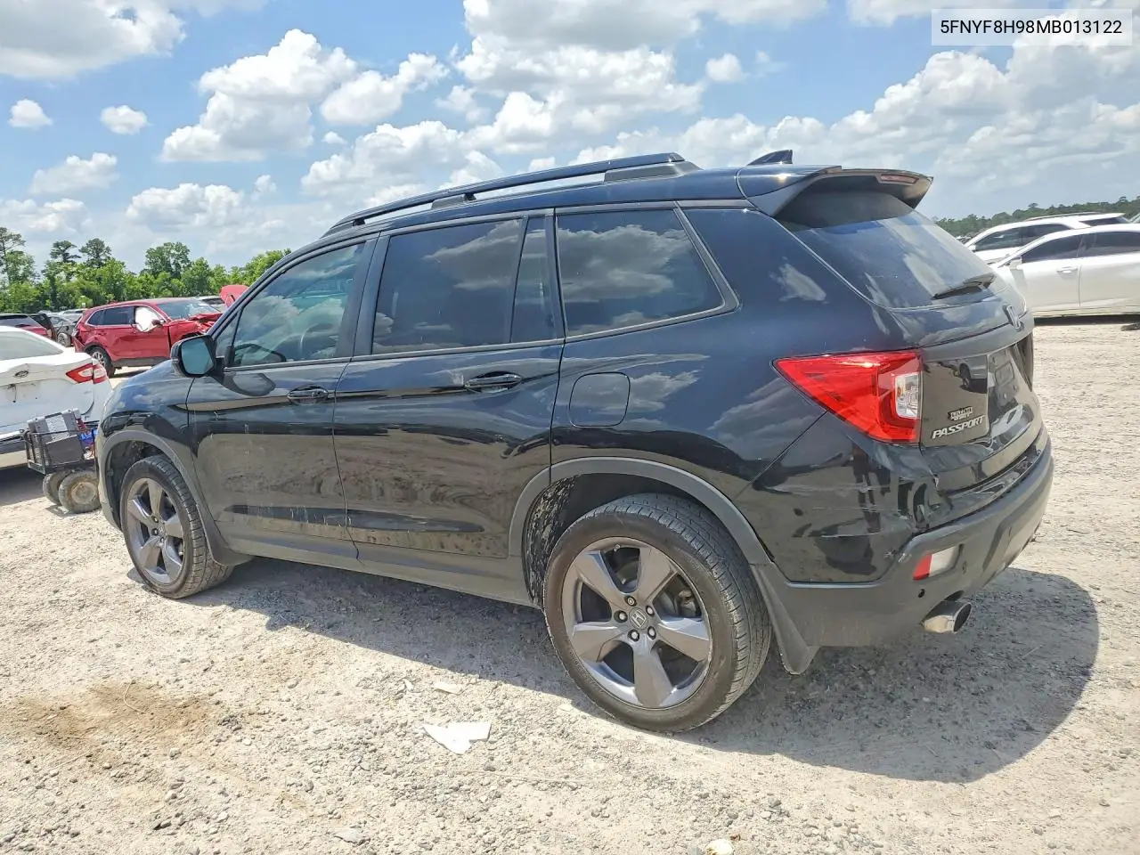 2021 Honda Passport Touring VIN: 5FNYF8H98MB013122 Lot: 55556166