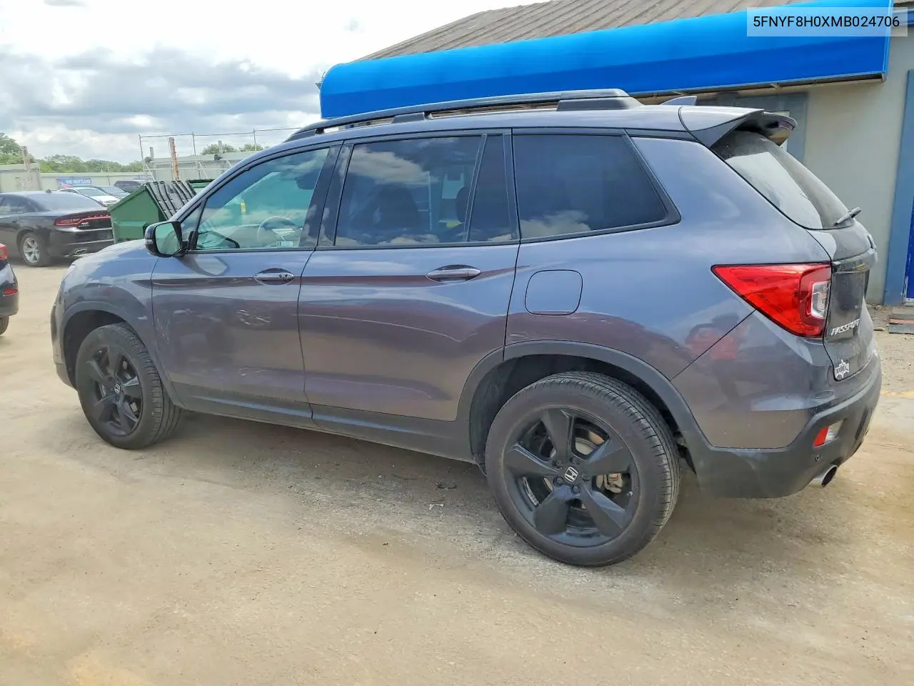 2021 Honda Passport Elite VIN: 5FNYF8H0XMB024706 Lot: 55950596