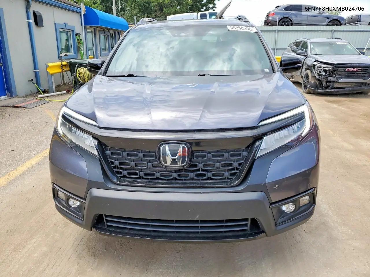 2021 Honda Passport Elite VIN: 5FNYF8H0XMB024706 Lot: 55950596
