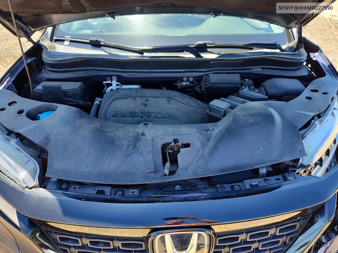 2021 Honda Passport Elite VIN: 5FNYF8H0XMB027590 Lot: 57405326