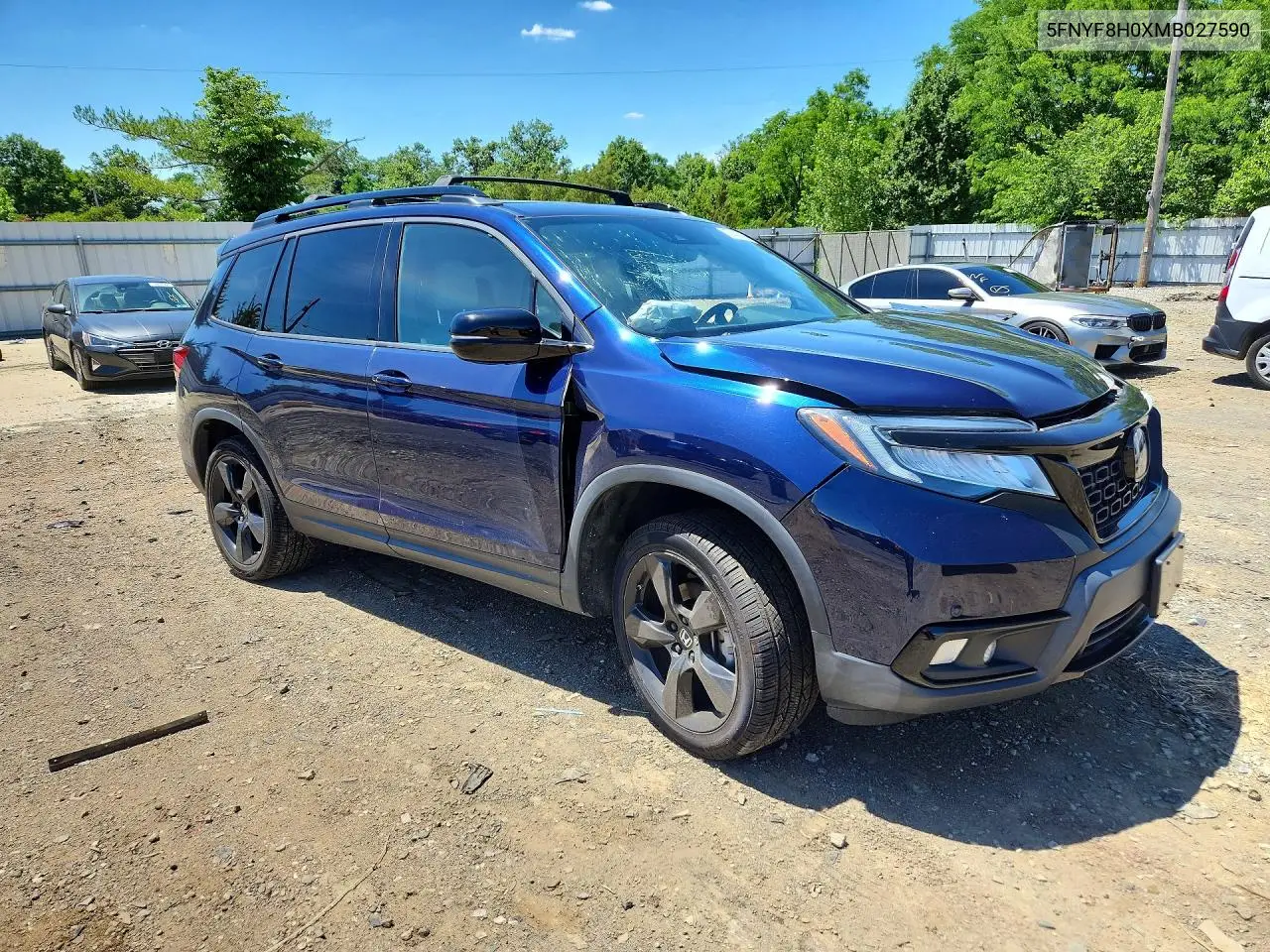 2021 Honda Passport Elite VIN: 5FNYF8H0XMB027590 Lot: 57405326