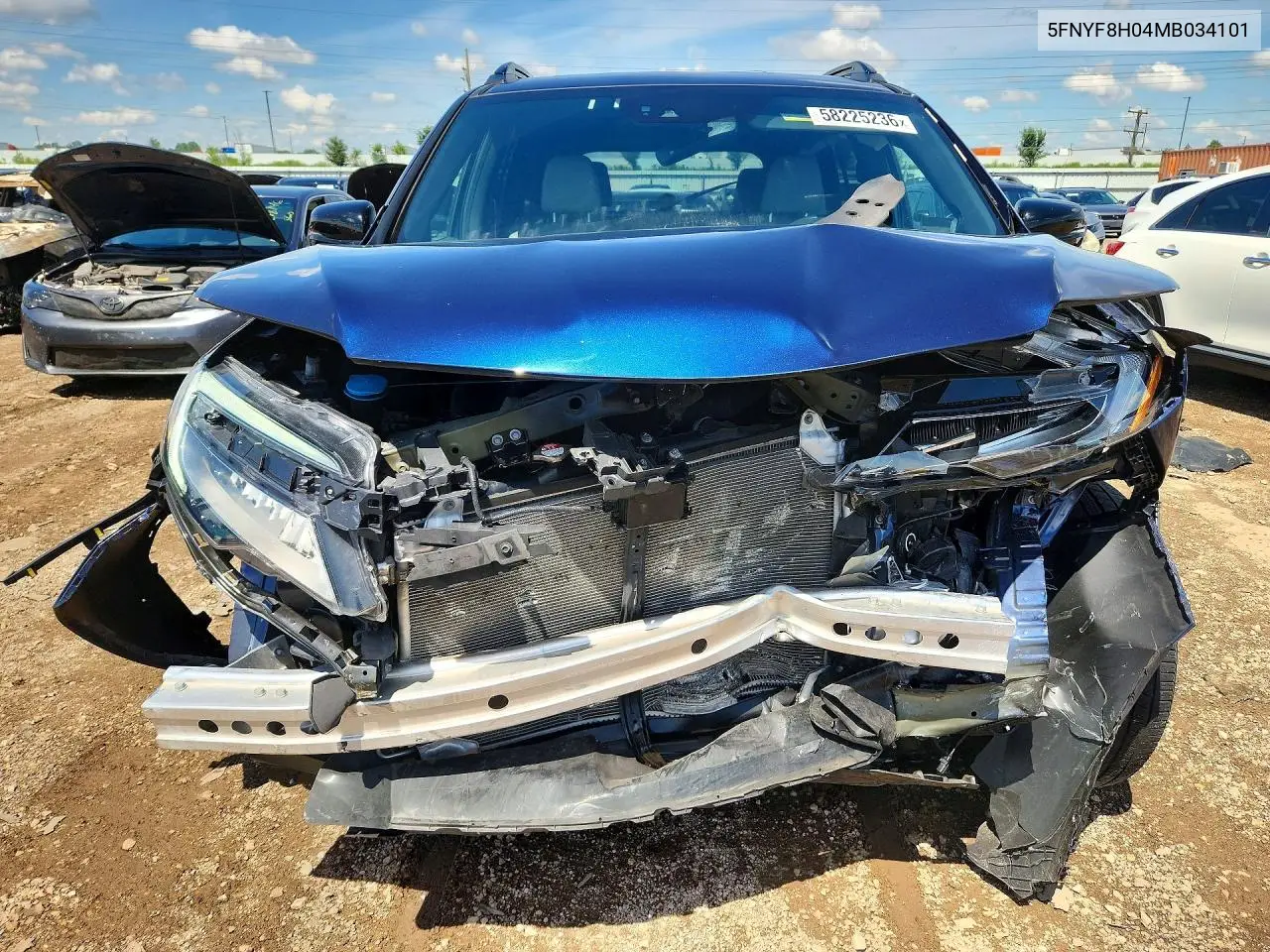 2021 Honda Passport Elite VIN: 5FNYF8H04MB034101 Lot: 58225236
