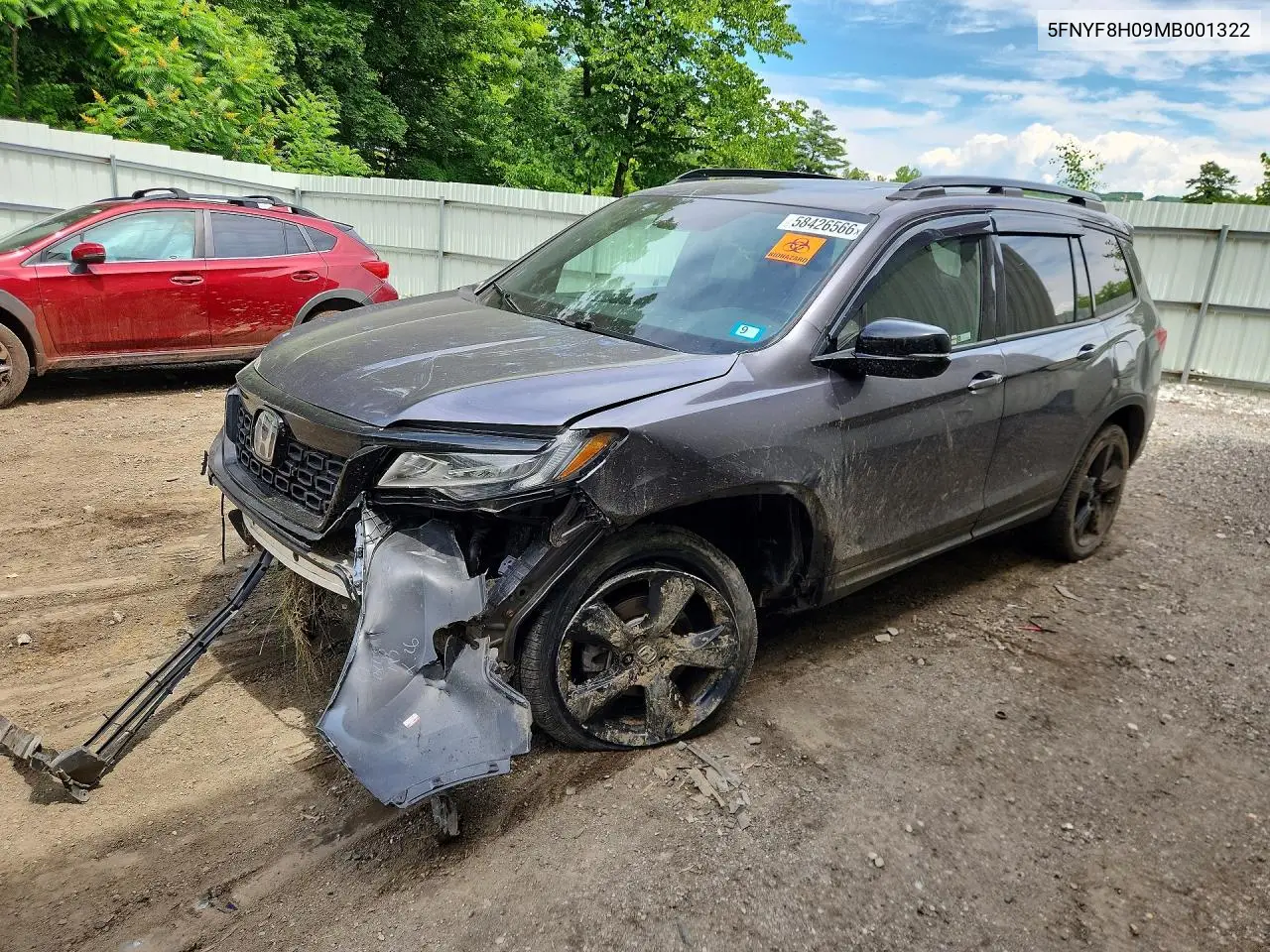 2021 Honda Passport Elite VIN: 5FNYF8H09MB001322 Lot: 58426566