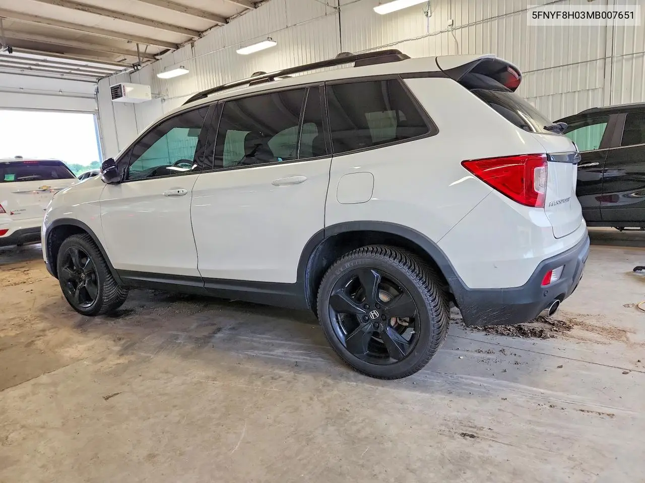 2021 Honda Passport Elite VIN: 5FNYF8H03MB007651 Lot: 60006496