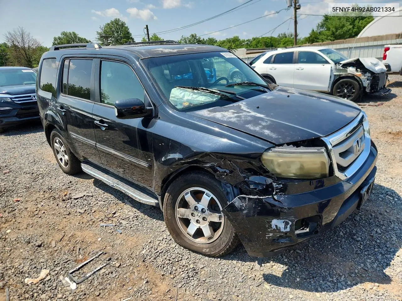 2010 Honda Pilot Touring VIN: 5FNYF4H92AB021334 Lot: 61933796
