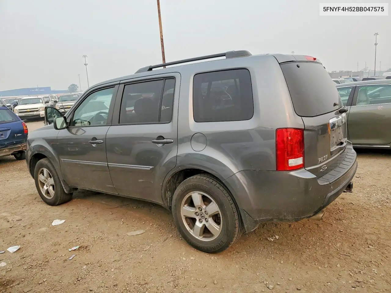 2011 Honda Pilot Exl VIN: 5FNYF4H52BB047575 Lot: 58456436