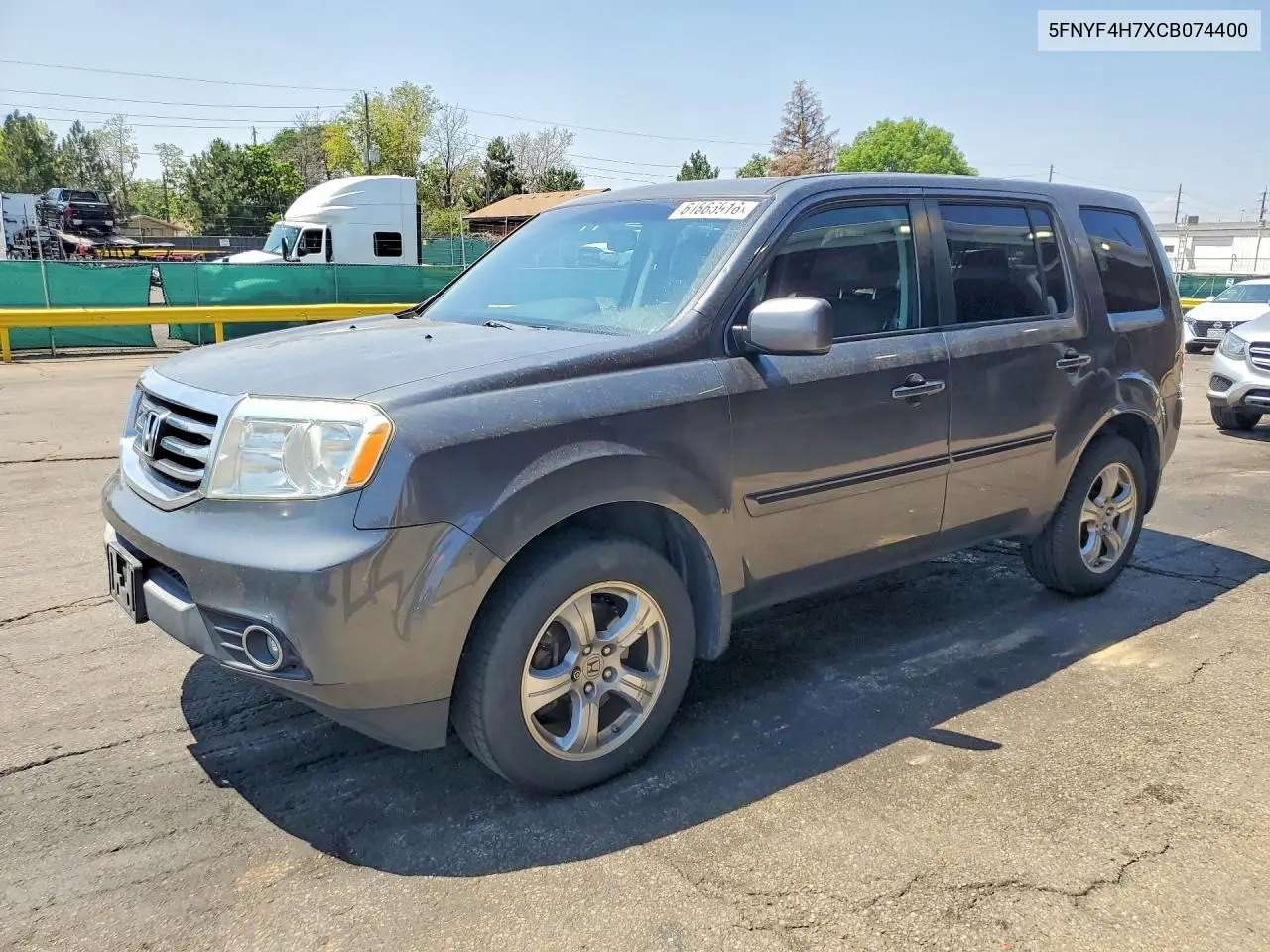 2012 Honda Pilot Exln VIN: 5FNYF4H7XCB074400 Lot: 61865916