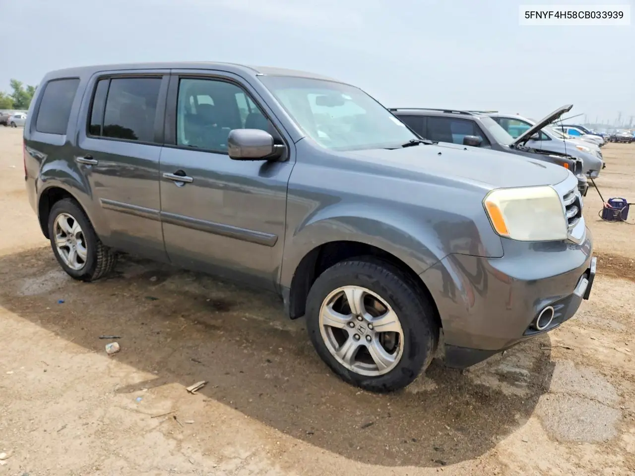 2012 Honda Pilot Exl VIN: 5FNYF4H58CB033939 Lot: 61964996