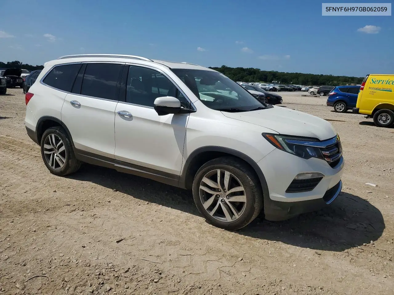 2016 Honda Pilot Touring VIN: 5FNYF6H97GB062059 Lot: 61394736
