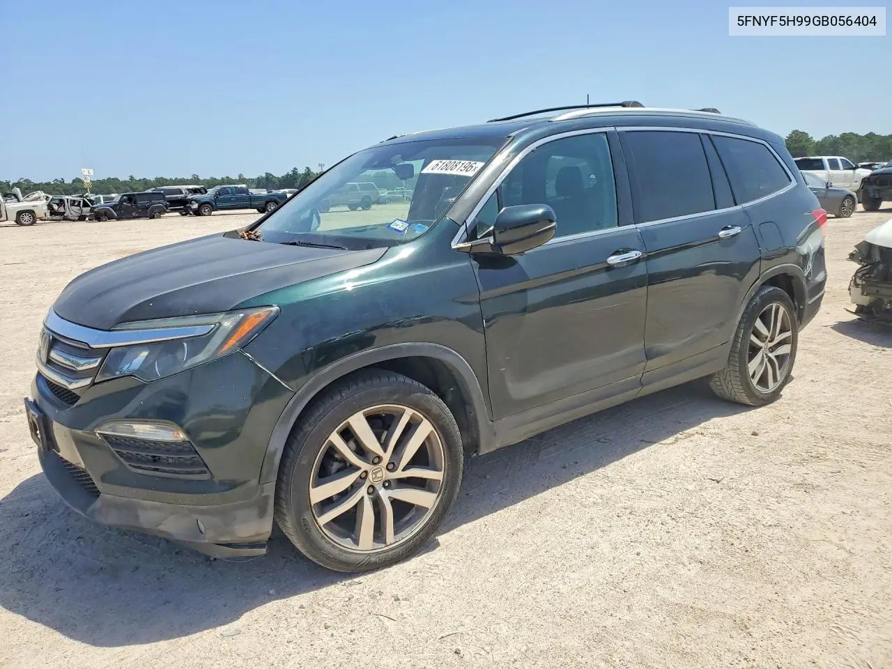 2016 Honda Pilot Touring VIN: 5FNYF5H99GB056404 Lot: 61808196