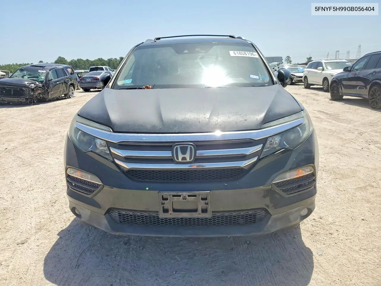 2016 Honda Pilot Touring VIN: 5FNYF5H99GB056404 Lot: 61808196