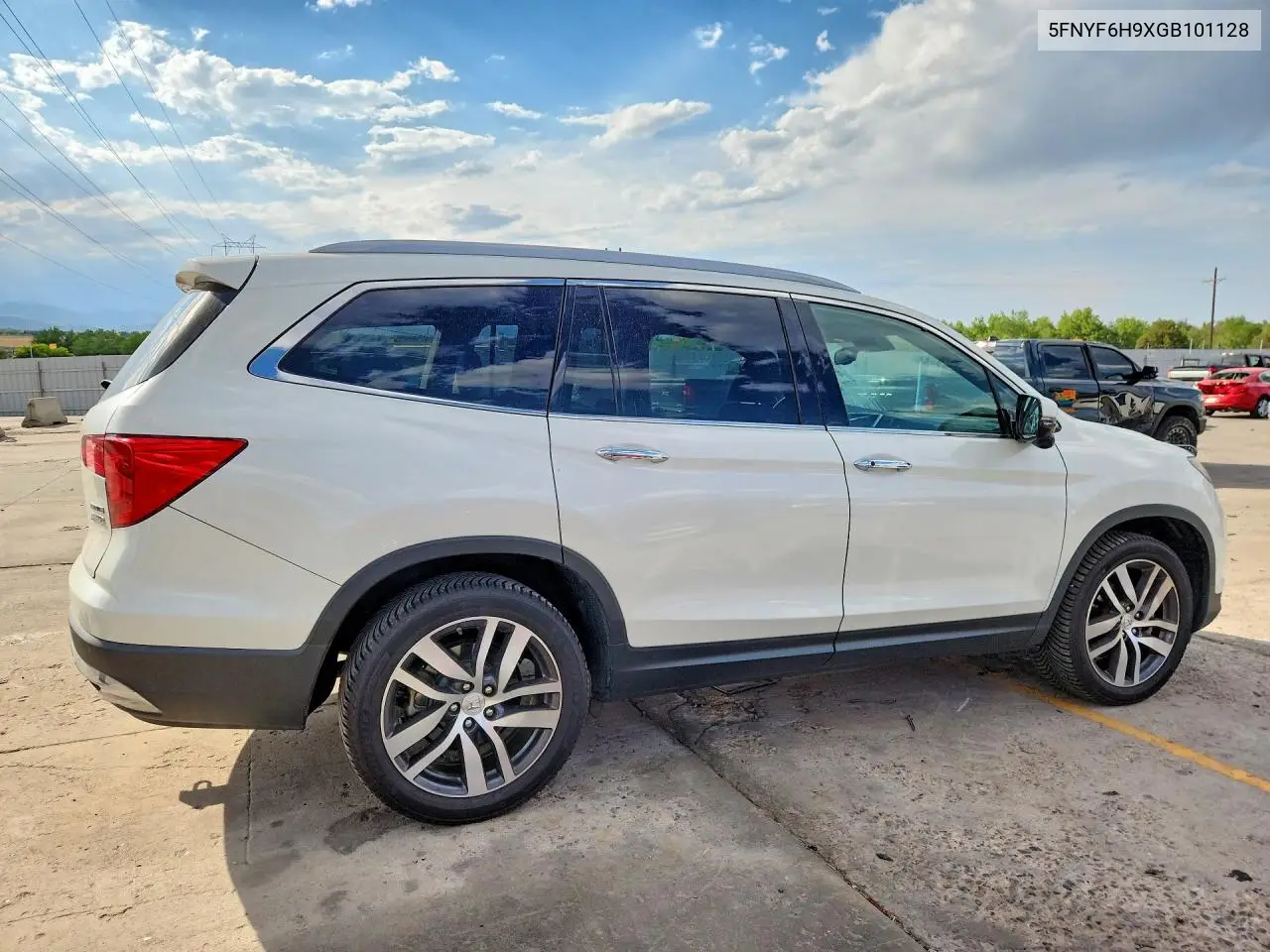 2016 Honda Pilot Touring VIN: 5FNYF6H9XGB101128 Lot: 61979326