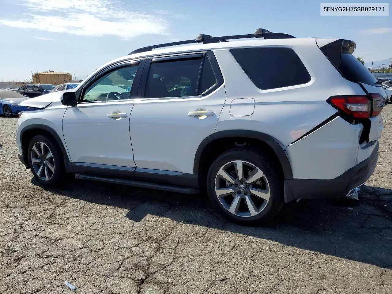 2025 Honda Pilot Touring VIN: 5FNYG2H75SB029171 Lot: 62147336