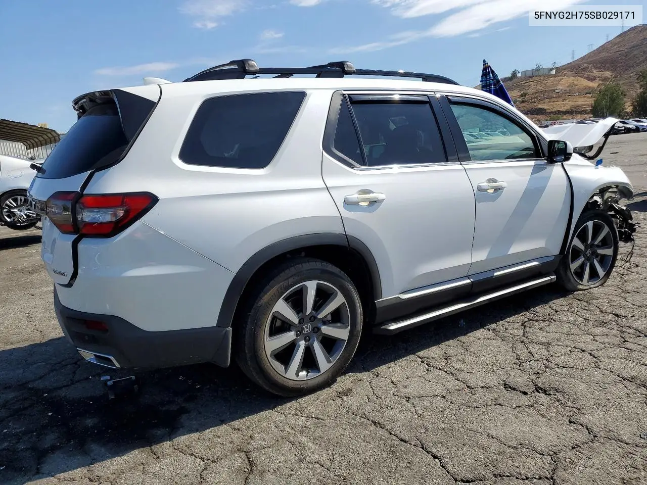 2025 Honda Pilot Touring VIN: 5FNYG2H75SB029171 Lot: 62147336