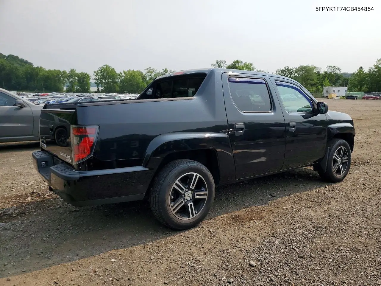 2012 Honda Ridgeline Sport VIN: 5FPYK1F74CB454854 Lot: 60667496