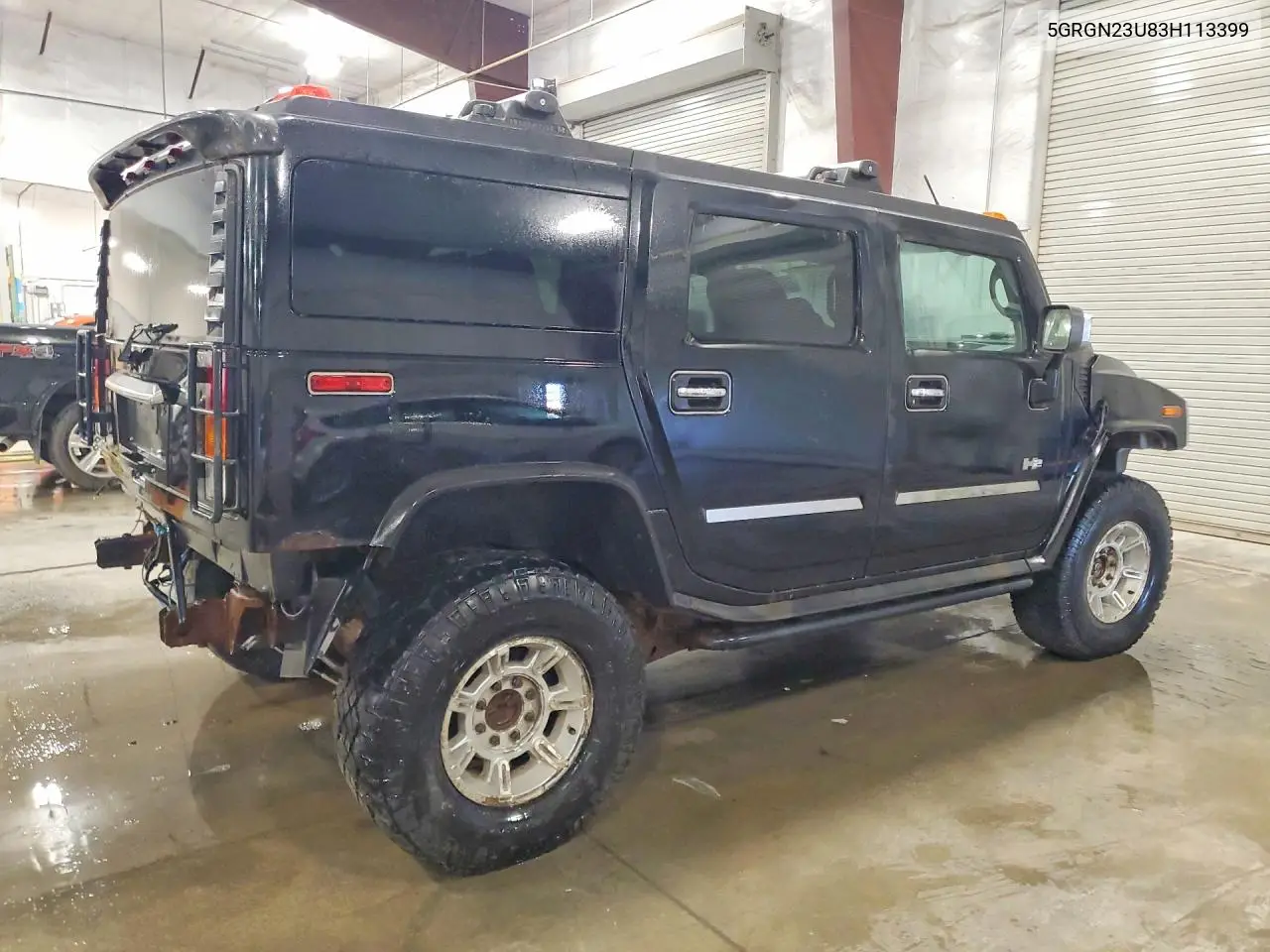 2003 Hummer H2 VIN: 5GRGN23U83H113399 Lot: 59582046