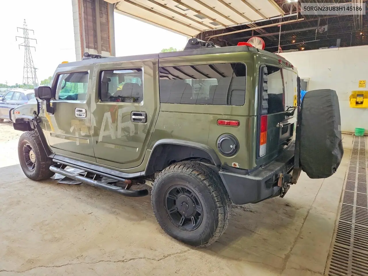 2003 Hummer H2 VIN: 5GRGN23U83H145186 Lot: 60513436