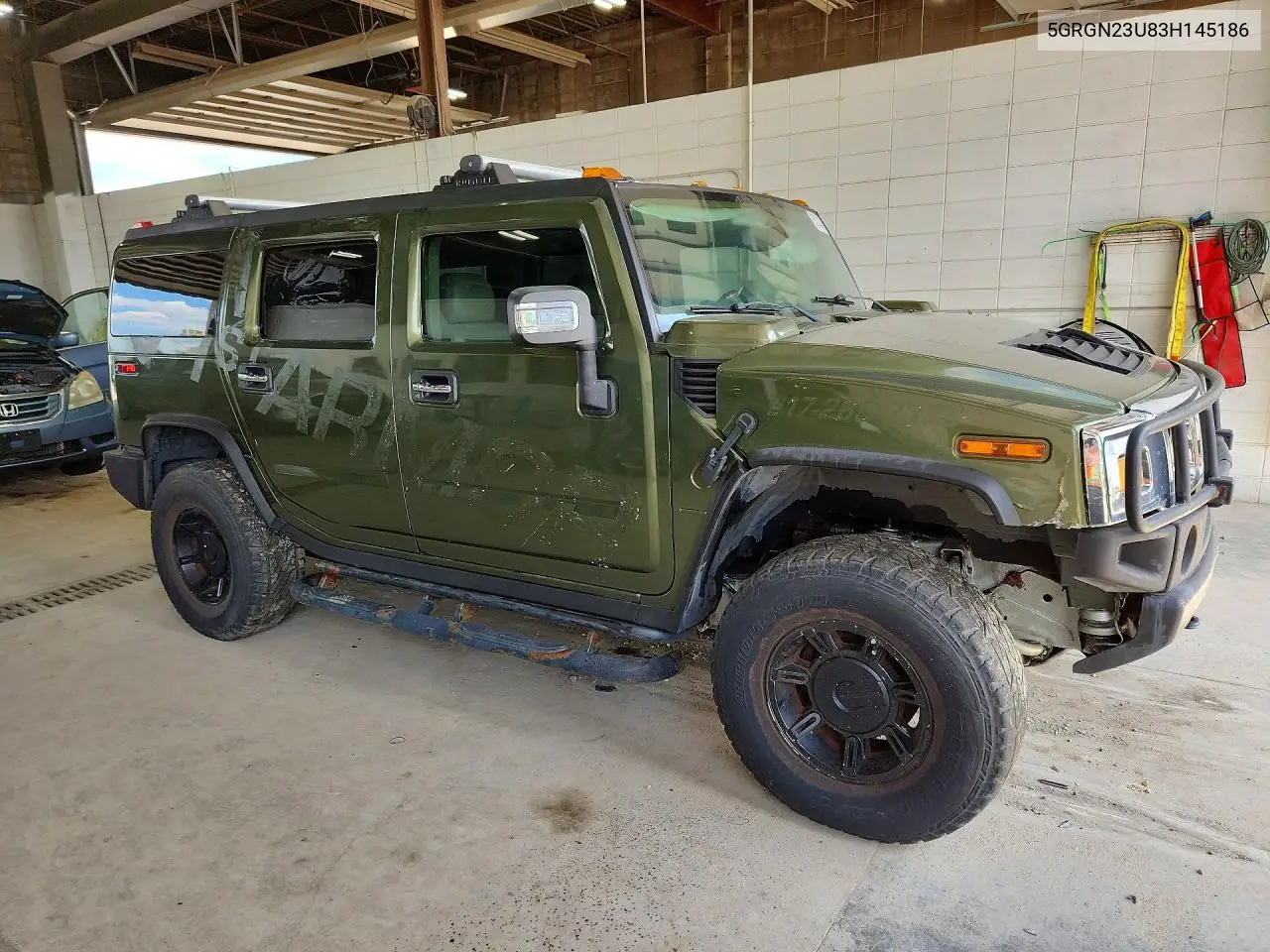 2003 Hummer H2 VIN: 5GRGN23U83H145186 Lot: 60513436