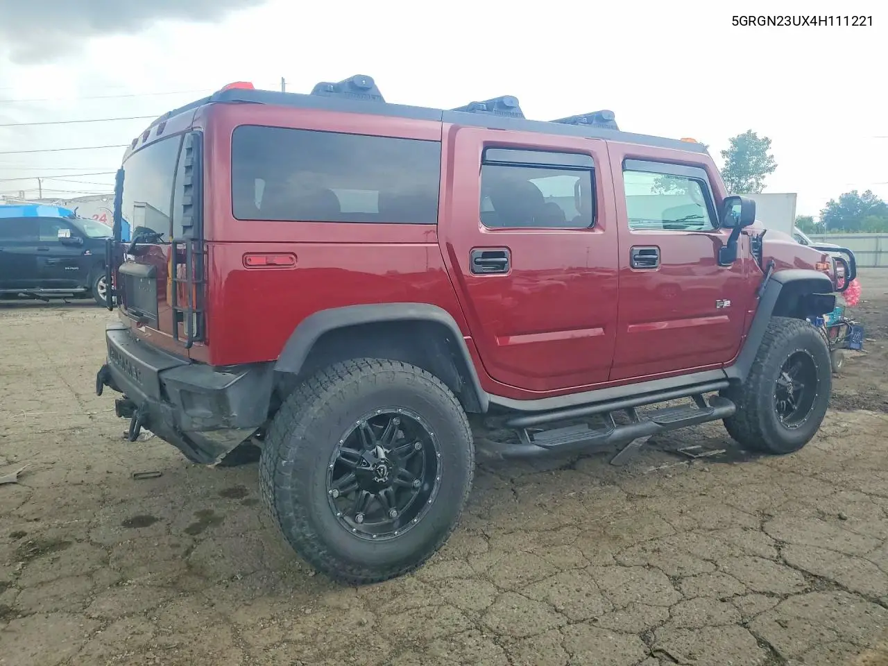 2004 Hummer H2 VIN: 5GRGN23UX4H111221 Lot: 55952736