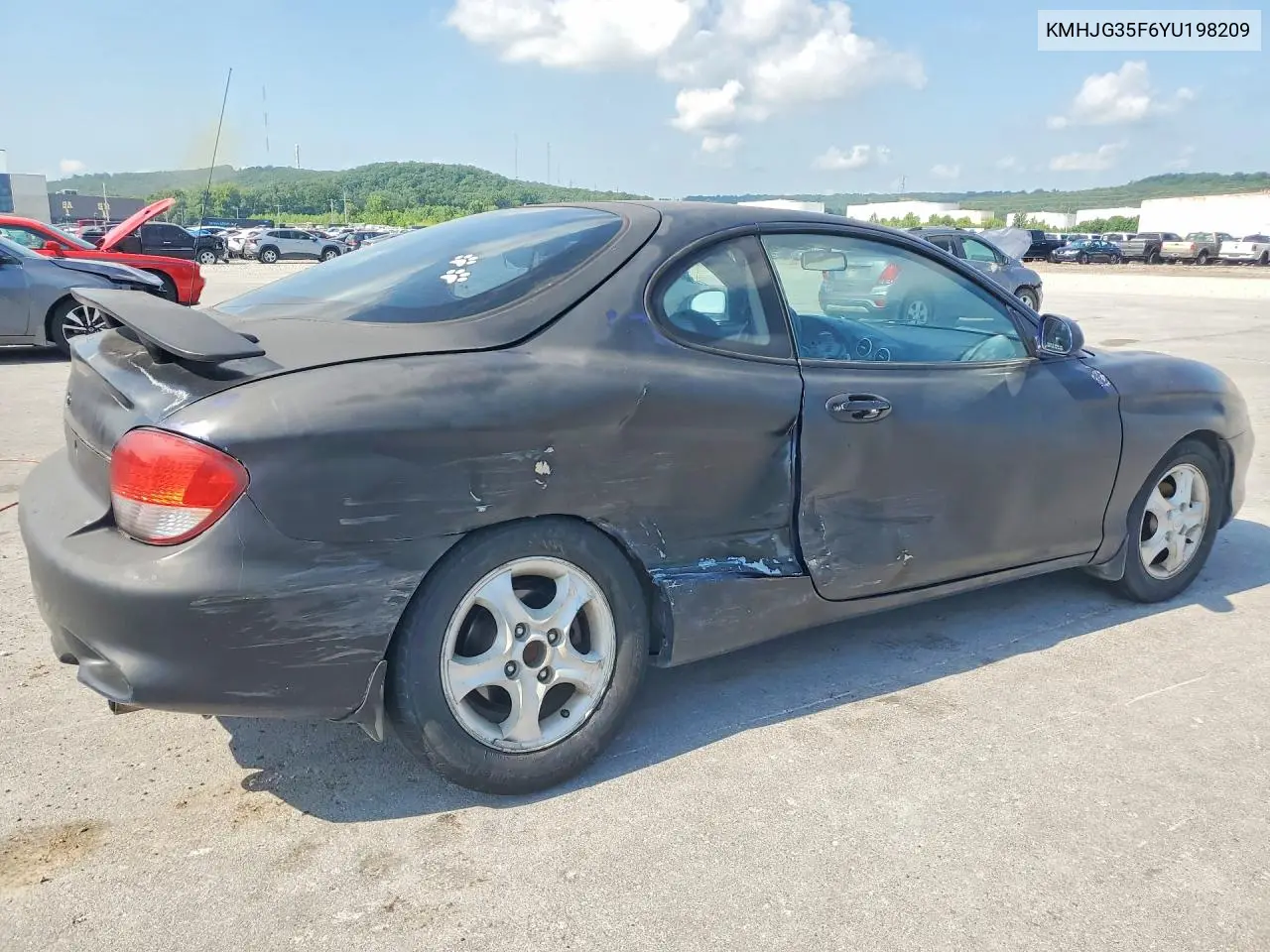 2000 Hyundai Tiburon Base VIN: KMHJG35F6YU198209 Lot: 60032326