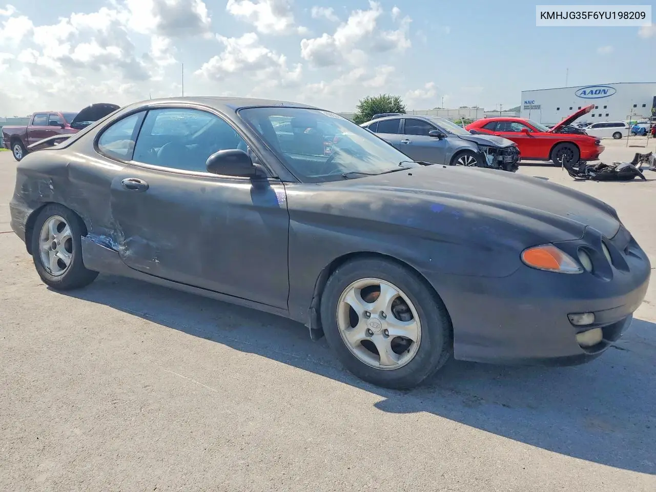 2000 Hyundai Tiburon Base VIN: KMHJG35F6YU198209 Lot: 60032326