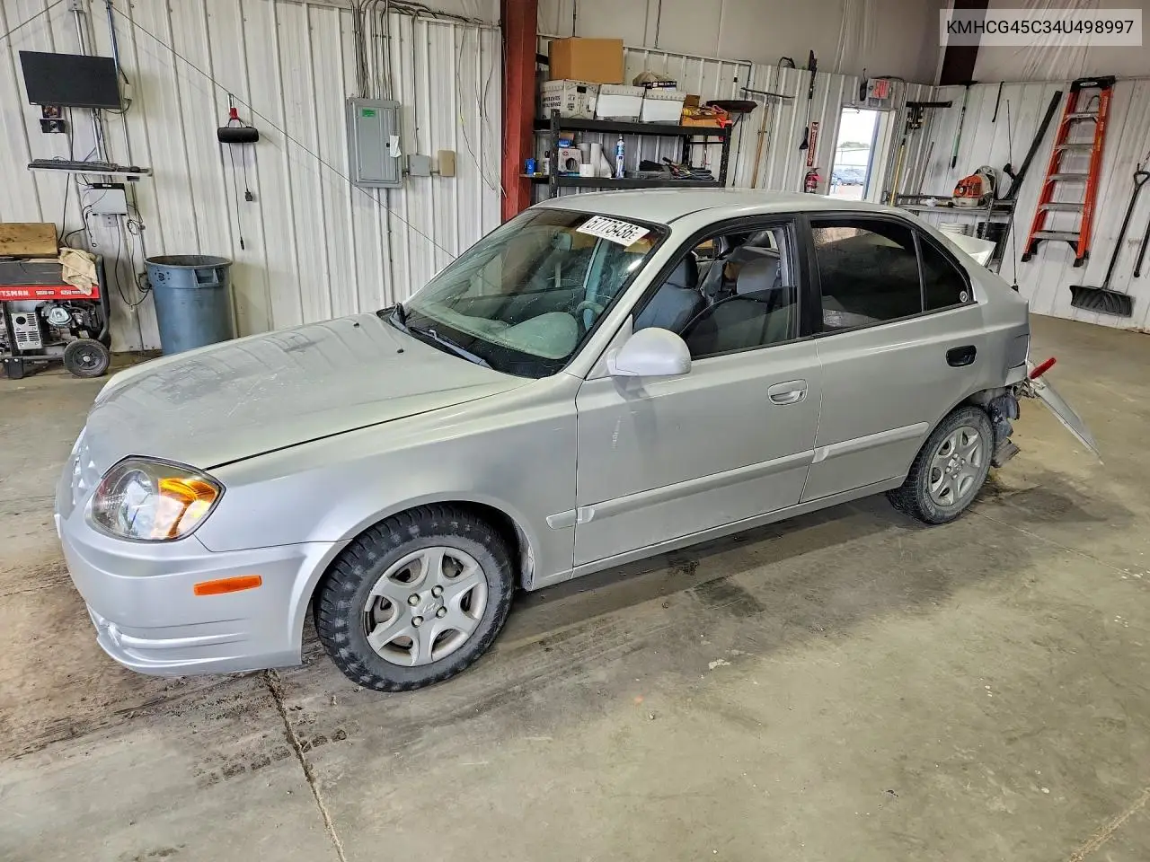 2004 Hyundai Accent Gl VIN: KMHCG45C34U498997 Lot: 57775436