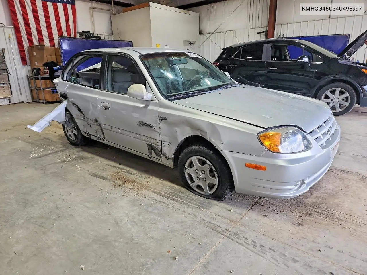 2004 Hyundai Accent Gl VIN: KMHCG45C34U498997 Lot: 57775436