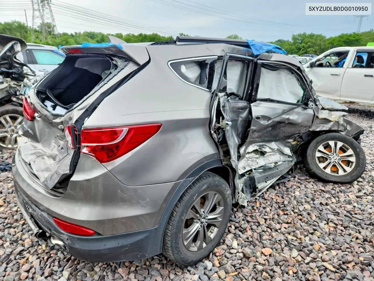 2013 Hyundai Santa Fe Sport 2.4L VIN: 5XYZUDLB0DG010950 Lot: 56842806