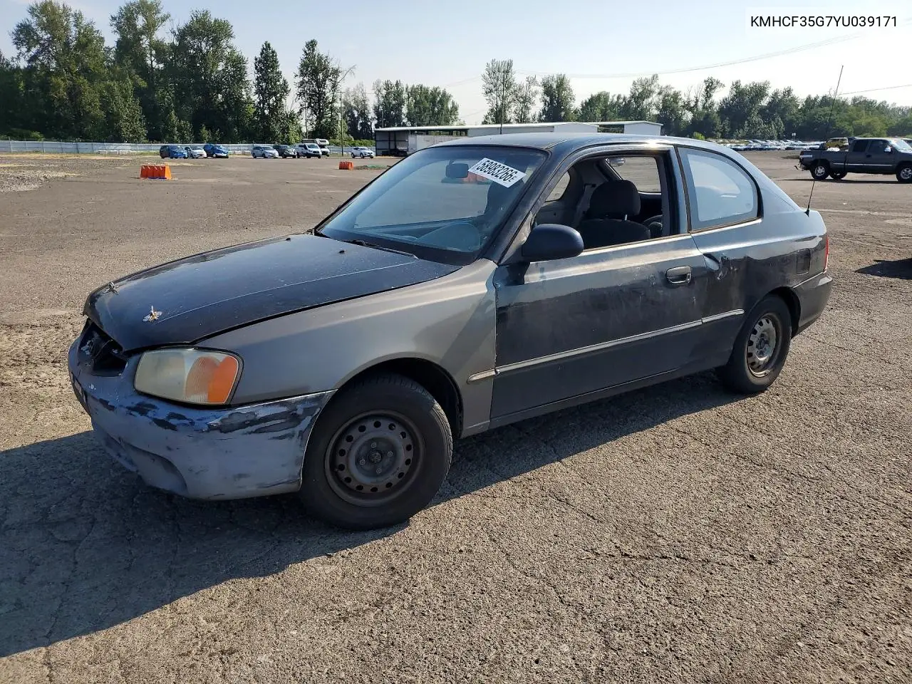 2000 Hyundai Accent L VIN: KMHCF35G7YU039171 Lot: 58983266