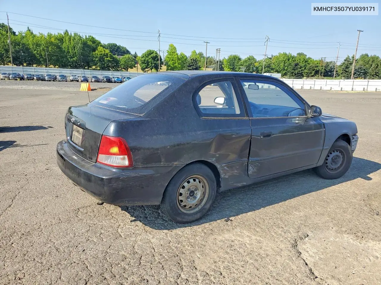 2000 Hyundai Accent L VIN: KMHCF35G7YU039171 Lot: 58983266