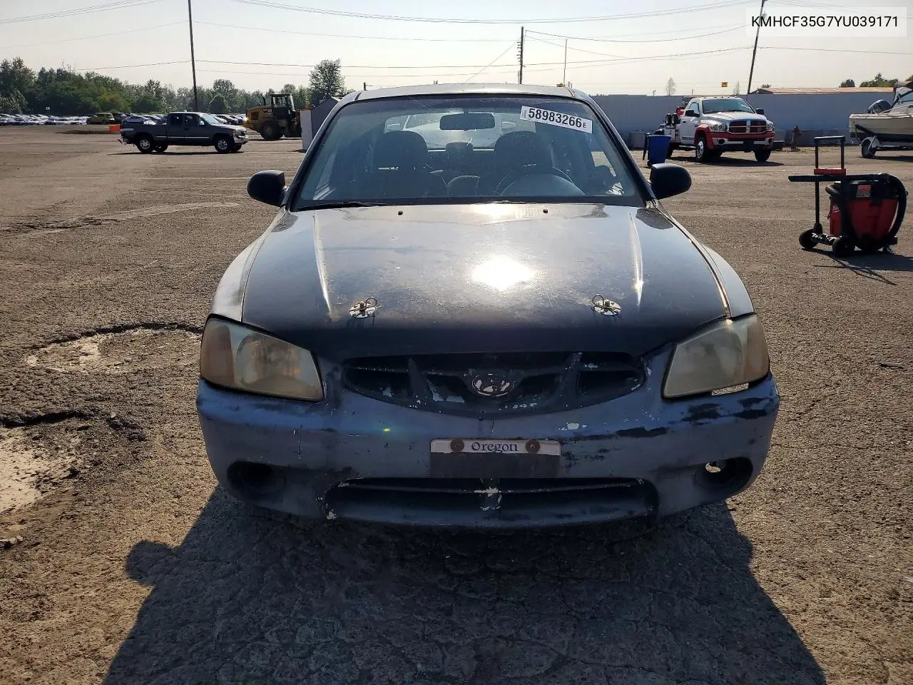 2000 Hyundai Accent L VIN: KMHCF35G7YU039171 Lot: 58983266