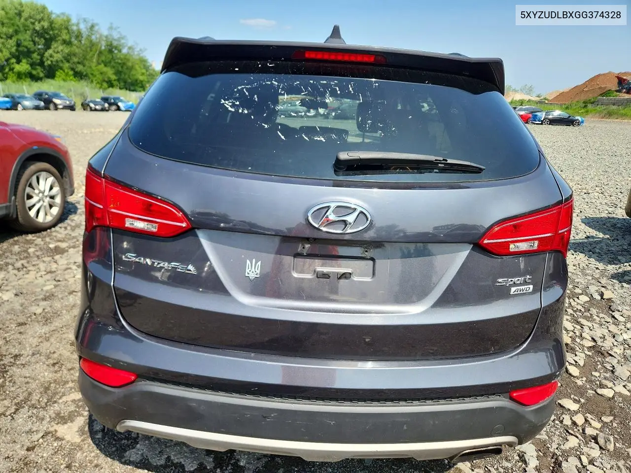 2016 Hyundai Santa Fe Sport 2.4L VIN: 5XYZUDLBXGG374328 Lot: 61344026