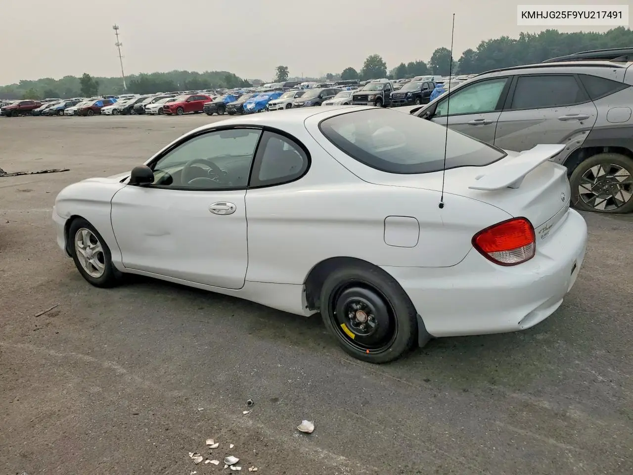 2000 Hyundai Tiburon Base VIN: KMHJG25F9YU217491 Lot: 61333366