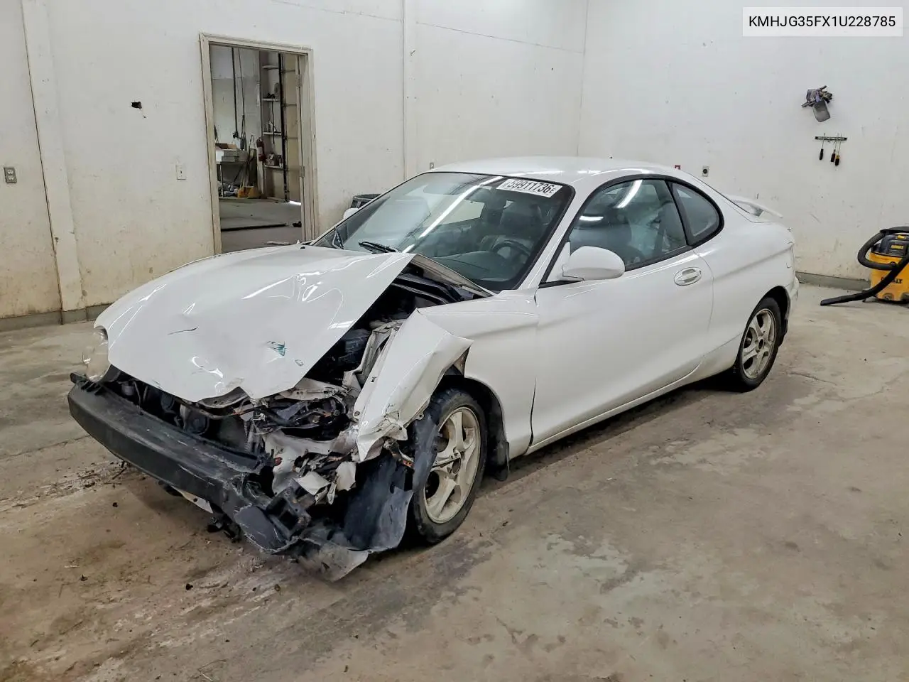 2001 Hyundai Tiburon Base VIN: KMHJG35FX1U228785 Lot: 59911736