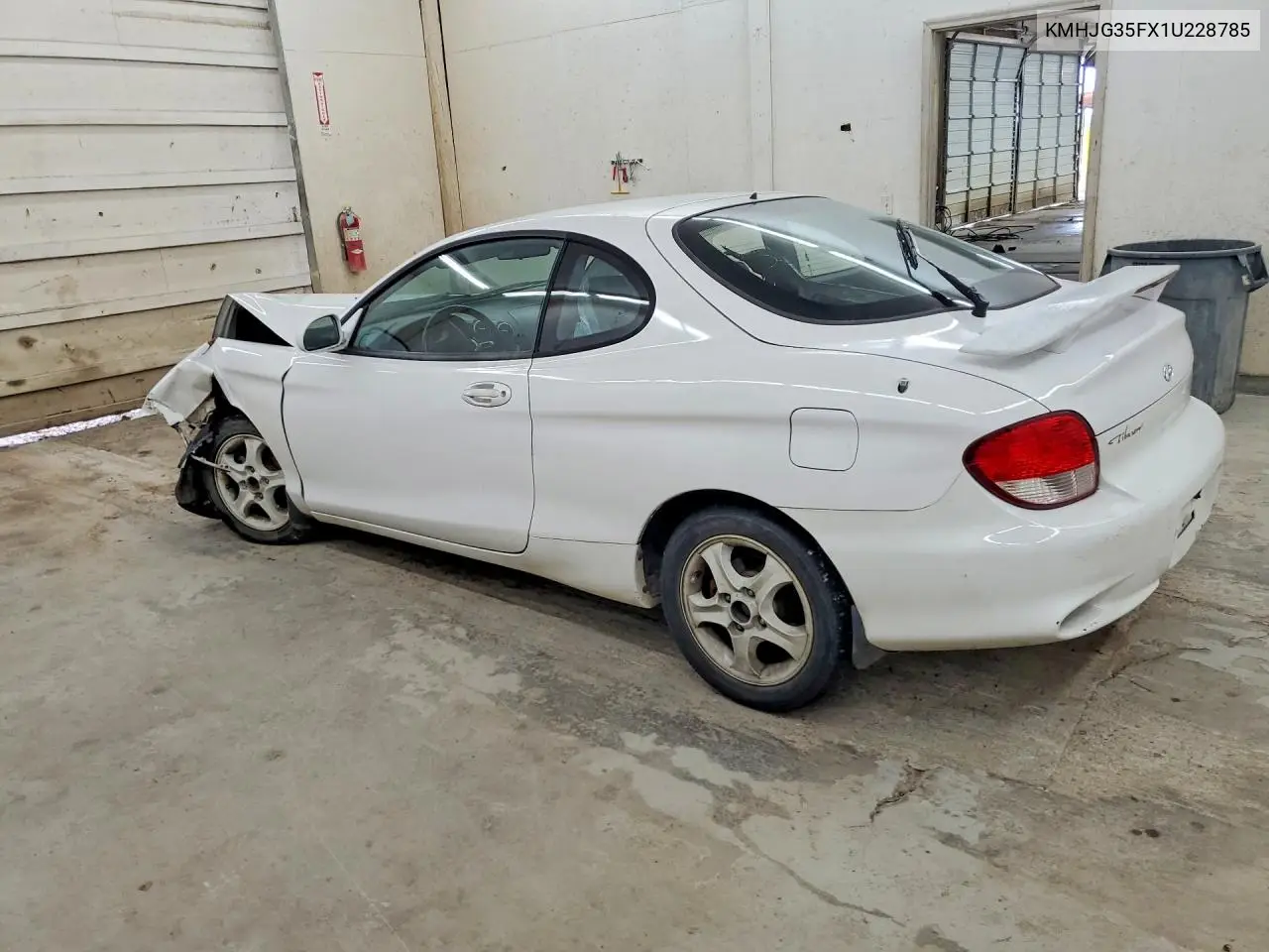 2001 Hyundai Tiburon Base VIN: KMHJG35FX1U228785 Lot: 59911736