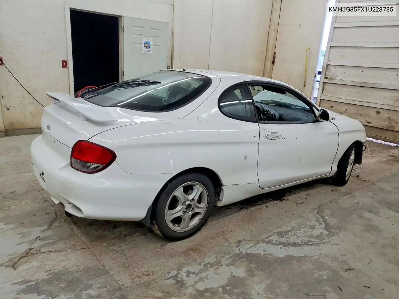 2001 Hyundai Tiburon Base VIN: KMHJG35FX1U228785 Lot: 59911736