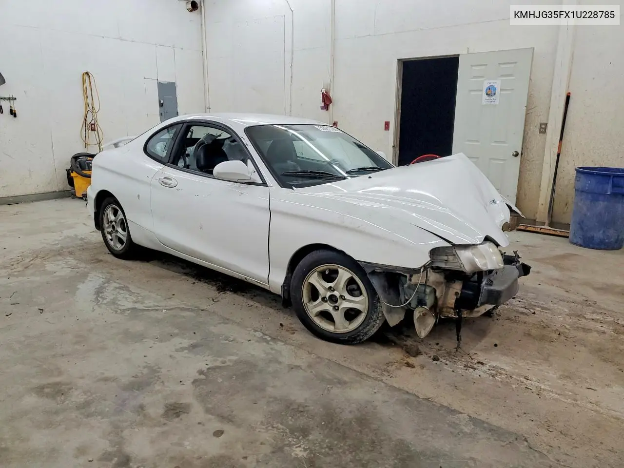 2001 Hyundai Tiburon Base VIN: KMHJG35FX1U228785 Lot: 59911736
